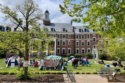 Photo of gathering of people on the lawn of the Graduate Life Center